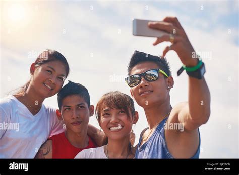 Make Memories With Friends A Group Of Smiling Friends Taking A Selfie