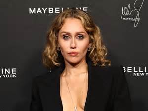 Miley Cyrus Poses Completely Naked While Embracing Her Natural Curls