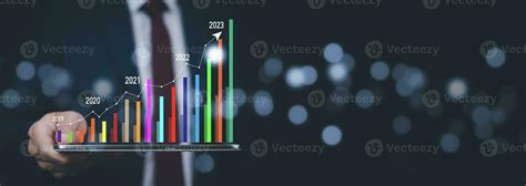 Businessman touch growth data chart arrow with diagram 2023 budget ...