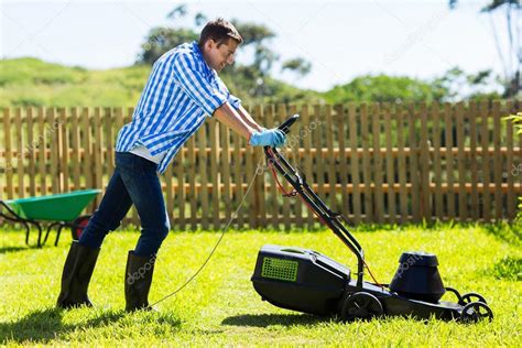 Man Mowing Lawn In The Backyard Stock Photo By ©michaeljung 46007753