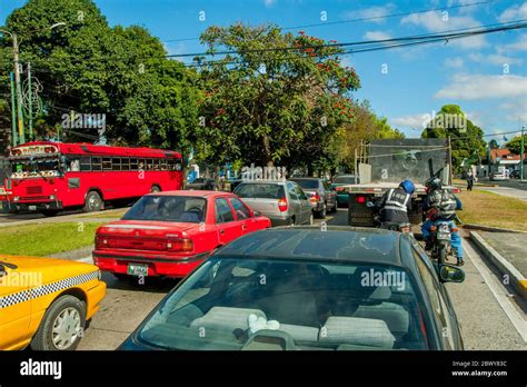 Street scene with traffic in Guatemala City in Guatemala Stock Photo ...