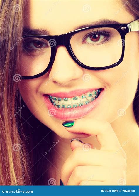 Happy Nerdy Teenage with Brace Wearing Eyeglasses Stock Photo - Image