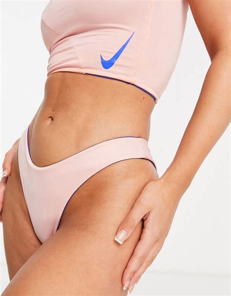 Nike Swimming Sling Cheeky Bikini Bottoms In Light Pink ShopStyle Two