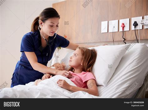 Female Nurse Examining Image And Photo Free Trial Bigstock