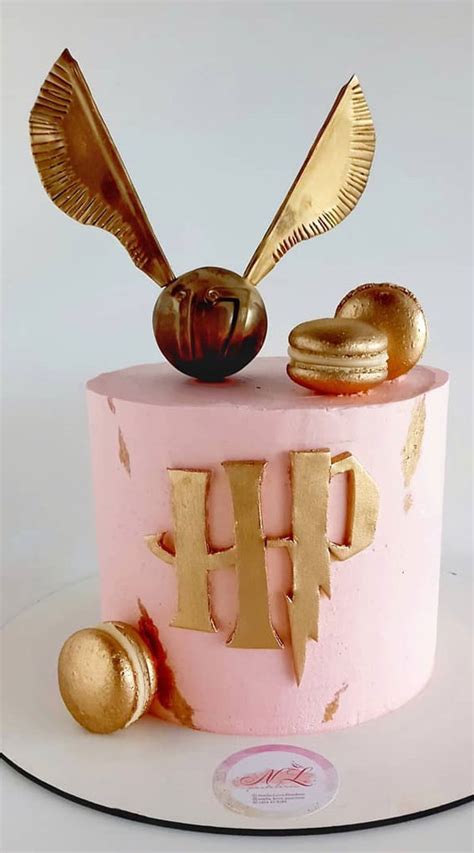 Harry Potter Cake Design Ideas The Golden Snitch Topped On Pink Cake