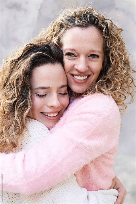 Beautiful Mother And Daughter Embracing