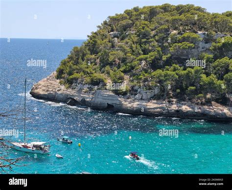 View Of Turquoise Sea In Beautiful Bay Cala Mitjaneta In Menorca Stock