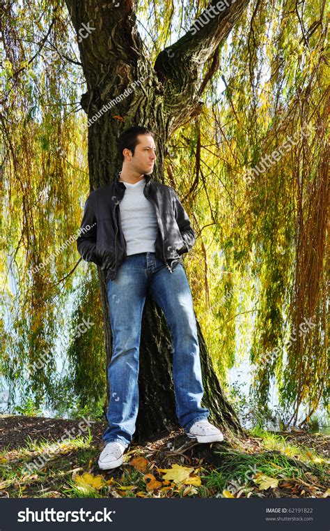 Young Man Leaning Against A Willow Tree Stock Photo 62191822 Shutterstock