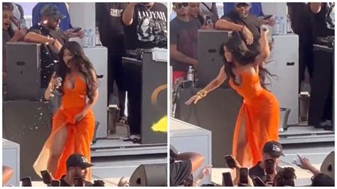 Cardi B Hurls Her Mic At Fan Who Threw Drink At Her During Concert