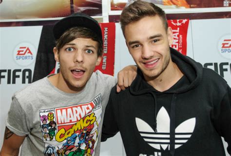 Liam Payne Y Louis Tomlinson Se Besan En Pleno Concierto Red17