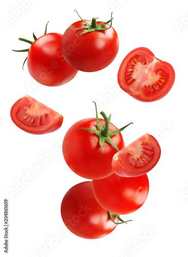 Falling Flying Tomato Isolated On White Background Stock Photo