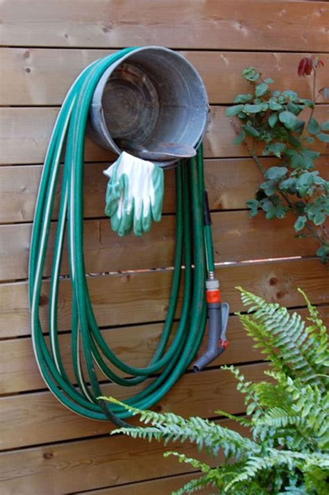 Diy Free Standing Garden Hose Hanger Garden Design Ideas