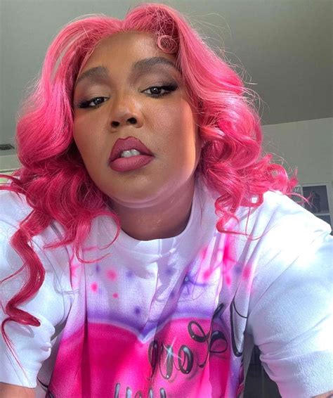 Lizzo Debuts New Hot-Pink Hair with Stunning Selfies and Dance Video