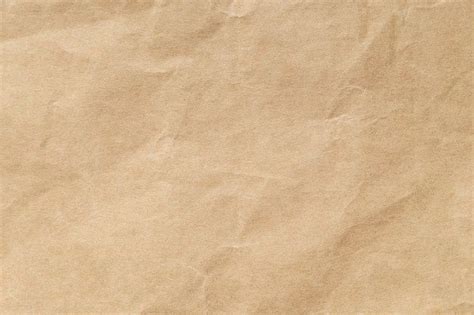 A Piece Of Brown Paper With Some Writing On It