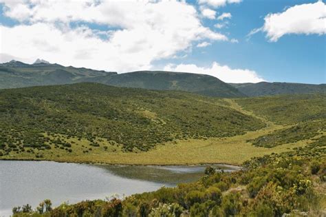 Premium Photo Scenic Lake Against A Mountain Background Lake Ellis