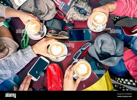 Group Of Friends Drinking Cappuccino At Coffee Bar Restaurants People