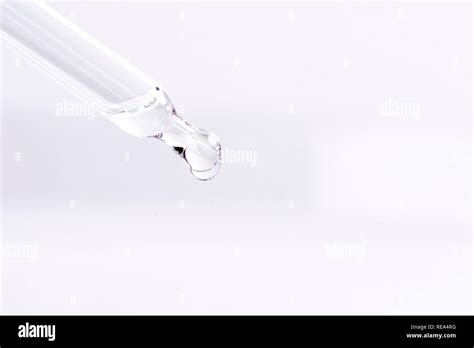 Dropping A Liquid From A Pipette Stock Photo Alamy