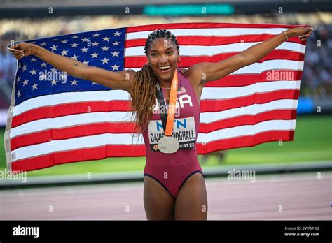 Tara Davis Celebrating His Medal With The Flag In The Budapest 2023