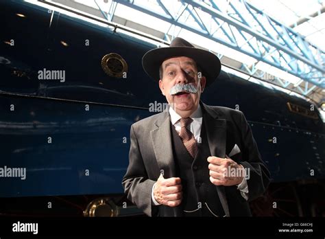 Chris Cade From Platform Theatre Dressed As Sir Nigel Gresley Next To