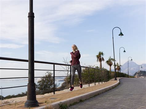 Fit Blonde Woman Running By Stocksy Contributor Milles Team Stocksy