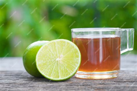 Premium Photo Honey And Lime On Wood Table