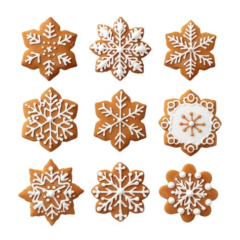 A Variety Of Christmas Gingerbread Cookies Are Laid Out On A Whi