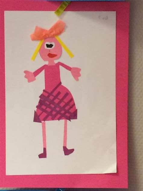 A Paper Cut Out Of A Cartoon Character On A Pink And White Background