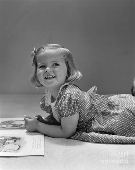 Girl With Picture Book C 1940s Photograph By H Armstrong Roberts Classicstock Pixels