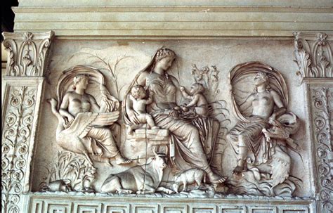 The Attributes Of The Central Figure On This Panel Of The Ara Pacis