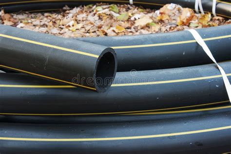 Black plastic sewer pipe stock photo. Image of long, sanitary - 46811430