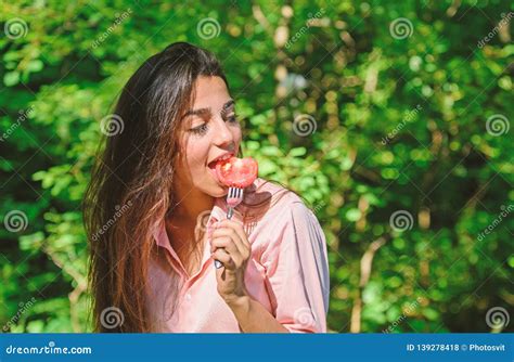 Girl Holds Fork With Juicy Ripe Tomato Lady Attractive Brunette Eats Tomato Seductive Appetite