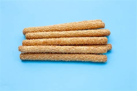 Premium Photo Bread Sticks On Blue Background