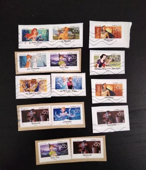 LOT DE 14 timbres France Disney 100 Ans d histoires à partager