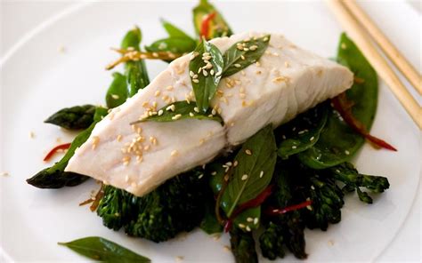 Tender Flaky Fish Is Steamed To Perfection With Fragrant Asian Herbs