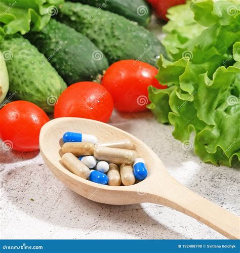 Healthy Food Vs Pills. Salmon, Vegetables and Fruis Vs Medicine and