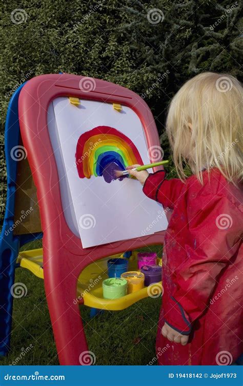 Child painting rainbow stock photo. Image of happy, yellow - 19418142