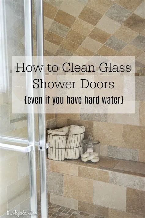 A Bathroom With Tiled Walls And Flooring That Says How To Clean Glass Shower Doors Even If You