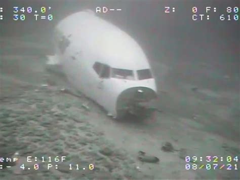 Photos show underwater wreckage of Boeing plane that crash-landed off ...