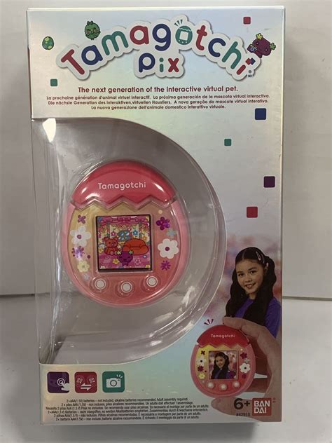 TAMAGOTCHI ON ANIMAL VIRTUEL INTERACTIF ROSE de chez BANDAI Gonçalves