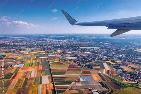 Airplane windows view above the earth on landmark down. View from an ...