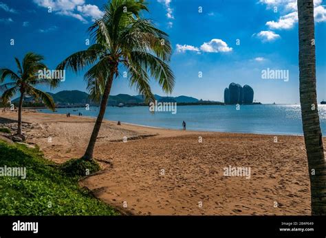 Beach In The Main City Part Of Sanya With The Buildings Of Phoenix