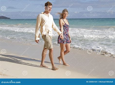 Couple Walks On The Beach Holding Hands Stock Photo Image Of Nature