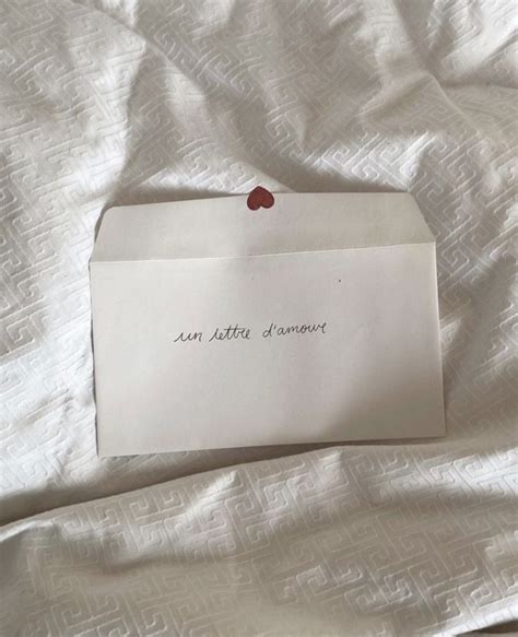 A Piece Of Paper That Is Laying On Top Of A Bed With The Words Sun