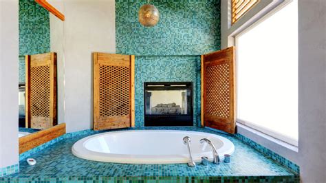 20 Gorgeous Bathrooms With Fireplaces To Cozy Up Your Space