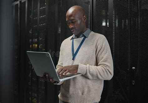 Server Room Laptop And Black Man Technician With Data Center