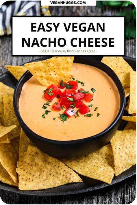 Easy Vegan Nacho Cheese In A Black Bowl With Tortilla Chips On The Side