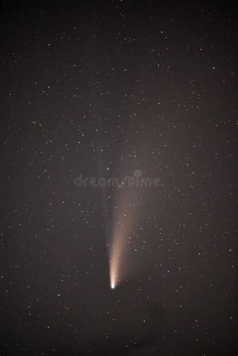 Bright Comet Neowise Shining In The Starry Night Sky Great For