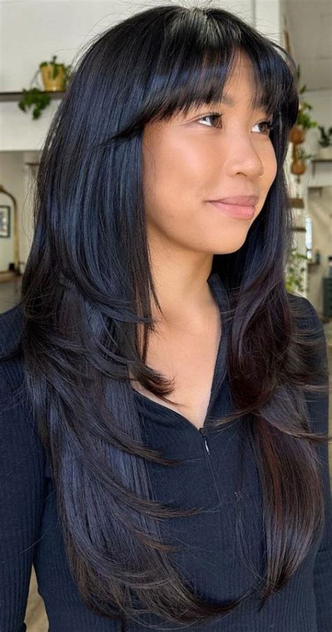 Long Layered Haircuts To Try Right Now Layered Haircut With Wispy