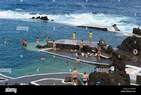 Madeira Portugal Tourists Swimming And Bathing In The Lava Rock Pools