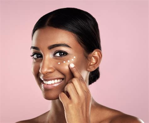 Premium Photo Smile Skincare And Face Of Woman With Cream In Studio